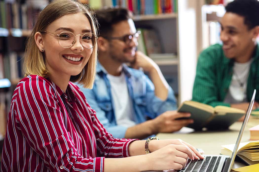 An image of a girl on a laptop 